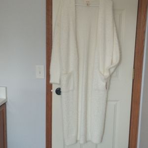 Long fuzzy white sweater